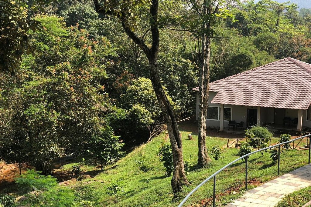 Abad Wayanad Brookside Cottage