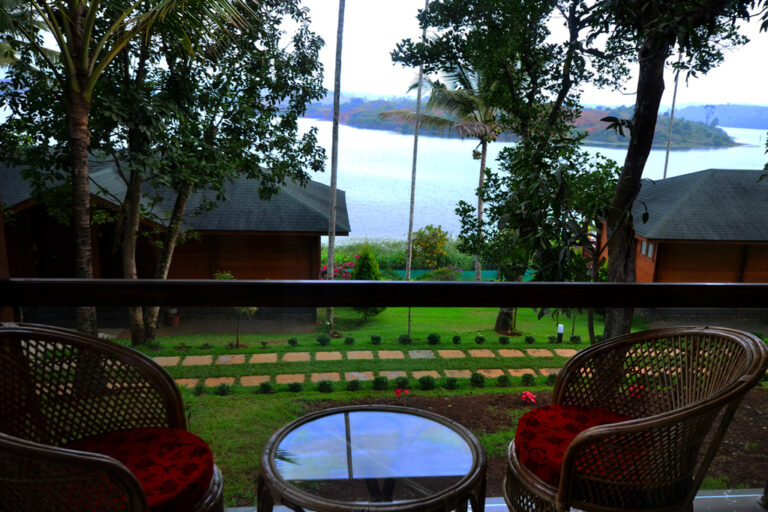 Balcony of lakeview room in Lakerose wayanad
