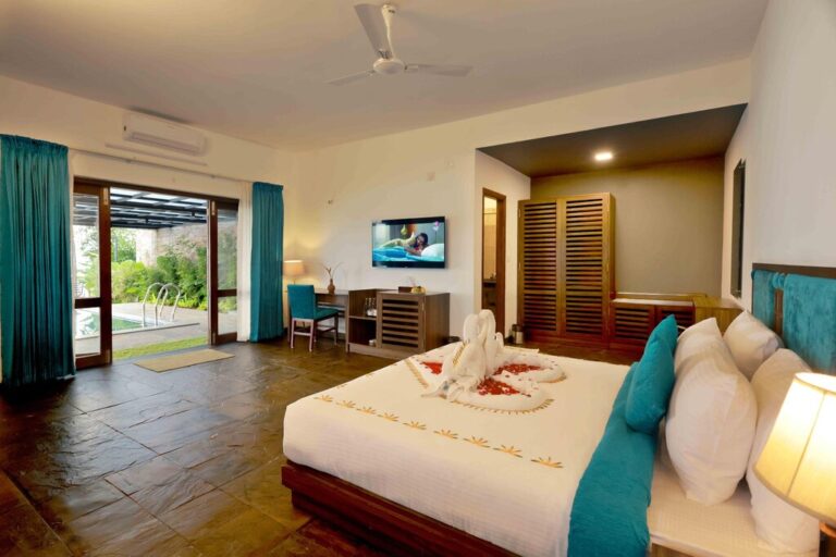 bedroom of pool villa in Vistara Wayanad